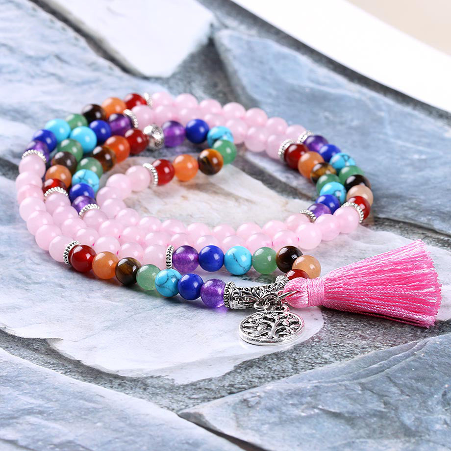 Friendship Strand Bracelets for Girls featuring colorful natural stone beads and a pink tassel charm.