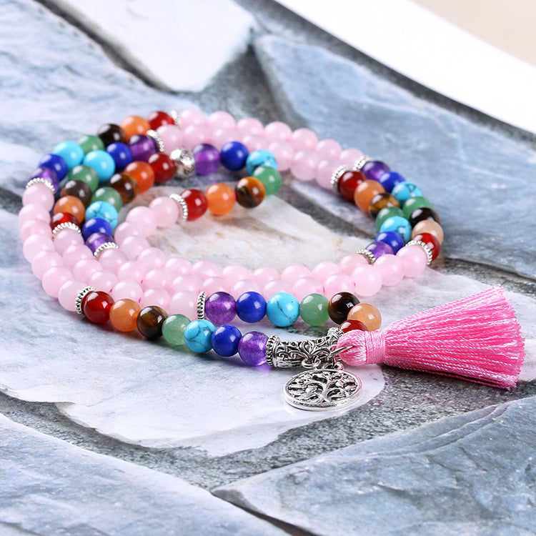 Friendship Strand Bracelets for Girls featuring colorful natural stone beads and a pink tassel charm.